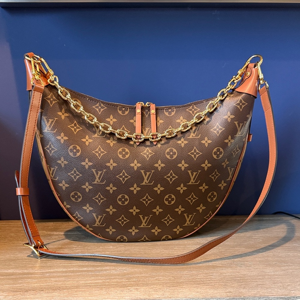 Louis Vuitton M46311 monogram loop hobo handbag. Like new !